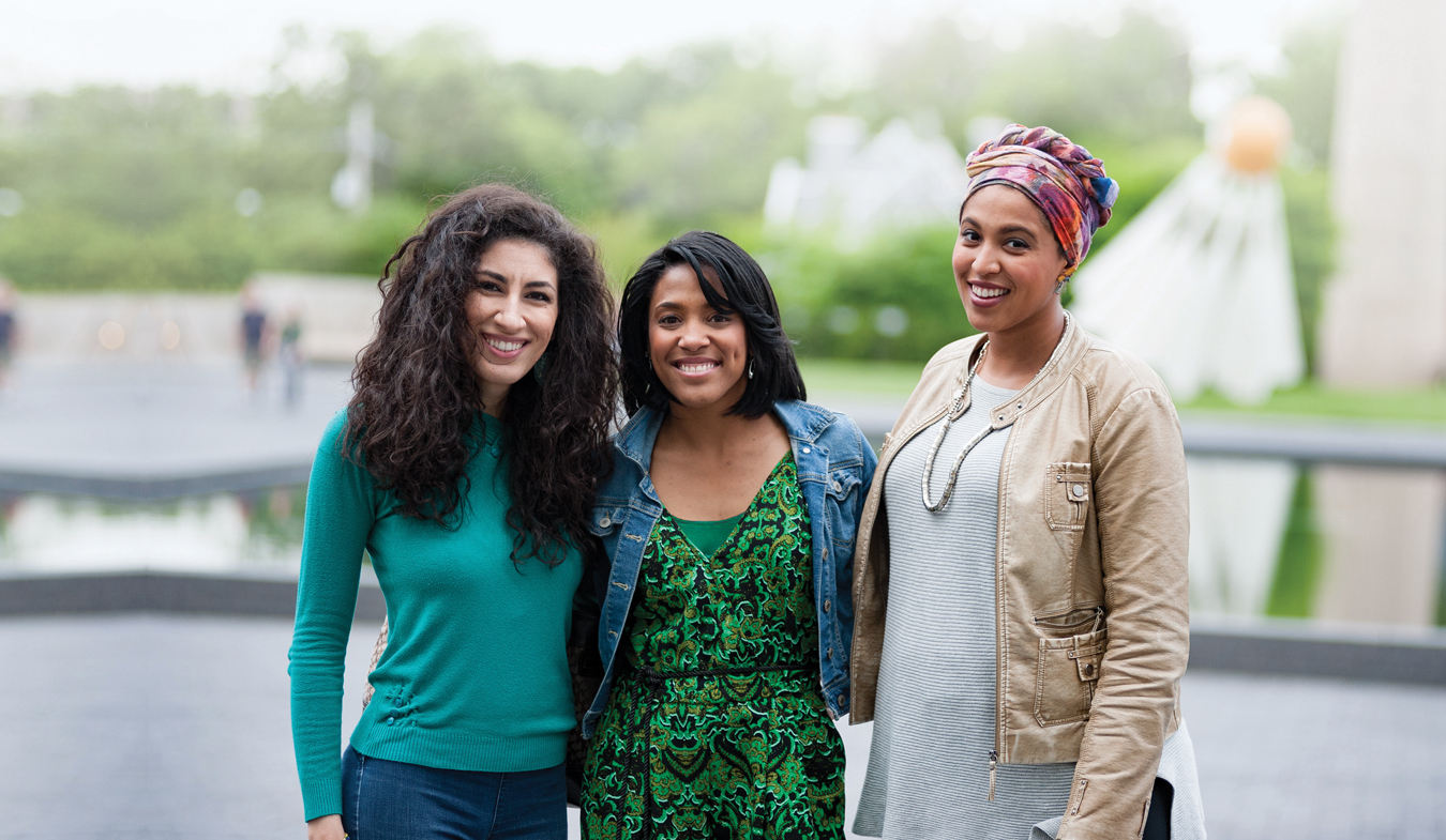 Women standing in front of the museum