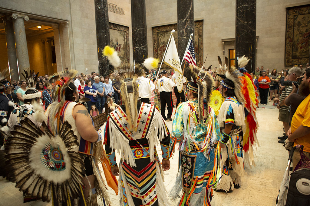 A multi-Tribal group of dancers from Haskell Indian Nations University and Veterans Color Guard assemble at the fourth annual Native American Cultural Celebration at the Nelson-Atkins in 2019. 