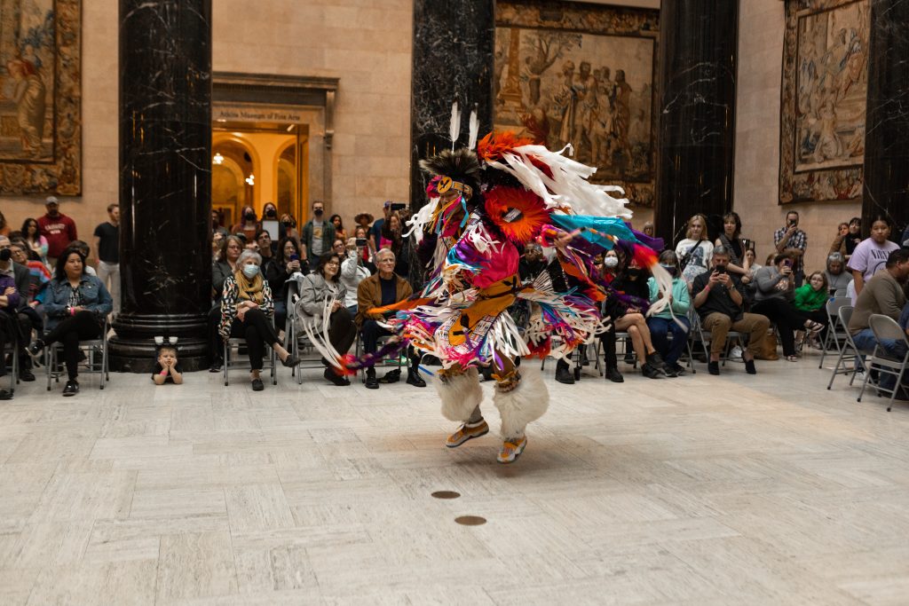 Native American performer dances in a cultural celebration at the Nelson-Atkins