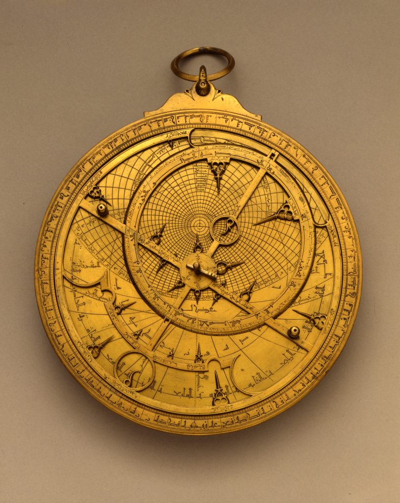 Picture of a gold astrolabe. 