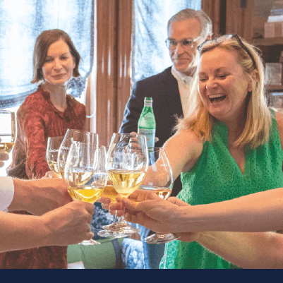 Happy guests raising glasses to toast at ShuttleCork evening 1