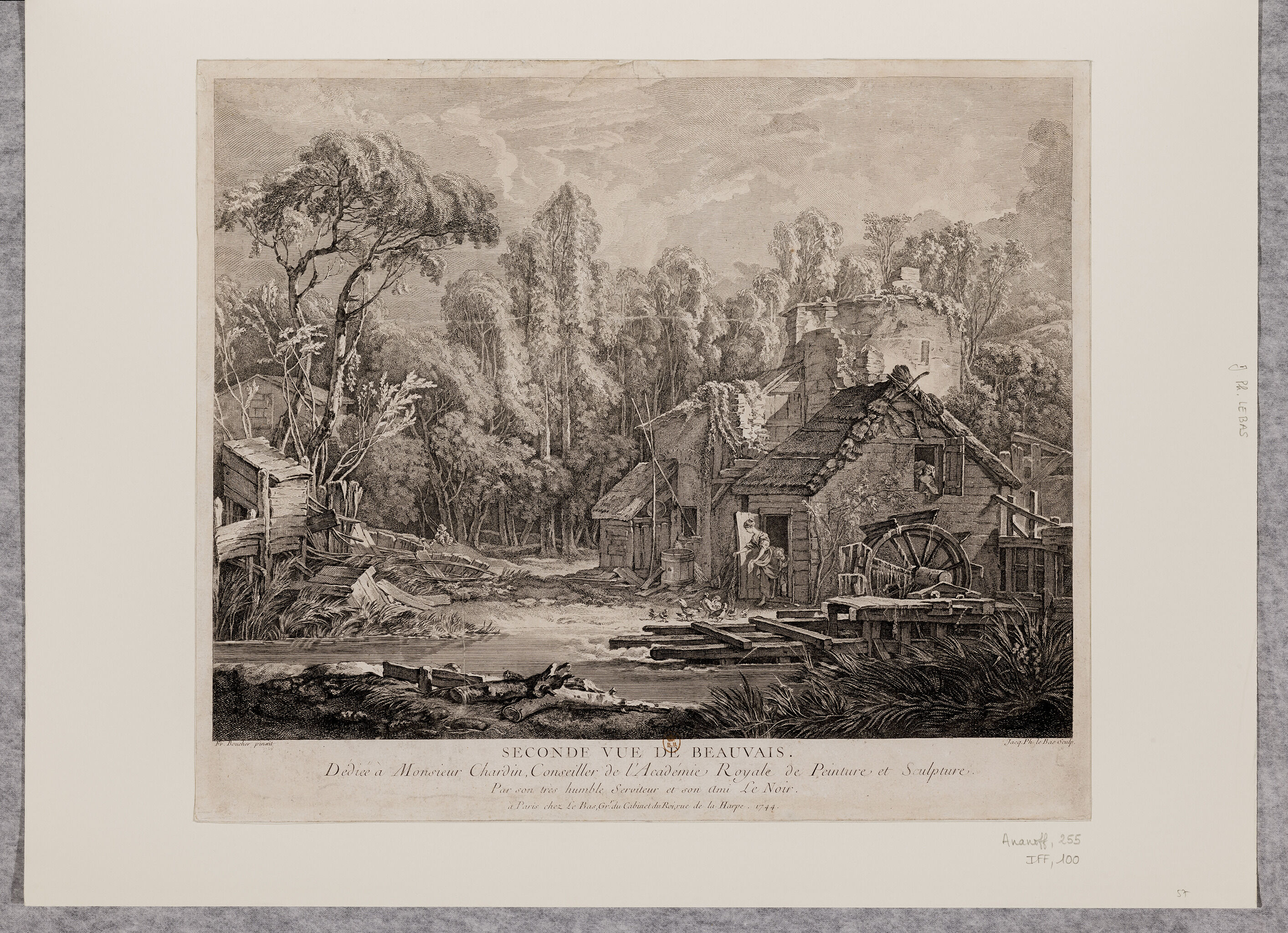 A black and white print of a structure with a wooden wheel on the river near it. A woman is seen looking down at small animals while opening a door. In the background, there is a large forest under a cloudy sky.