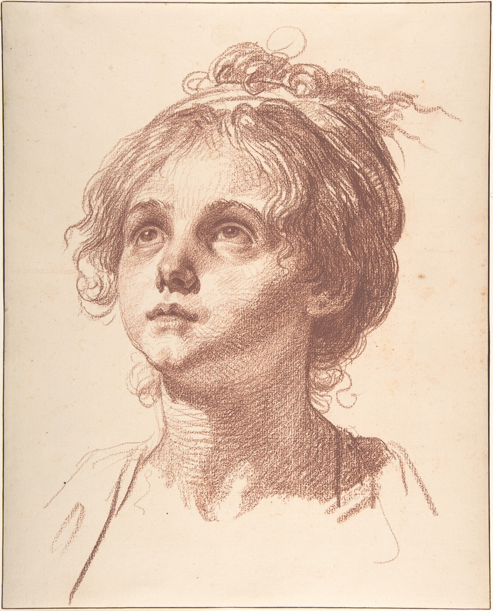 A sketch of the head of a girl. She has wavy hair that is wrapped by a tie or ribbon. Her both of her eyes are looking up. She is made up with red chalk and the lower half of her chest is left unfinished.