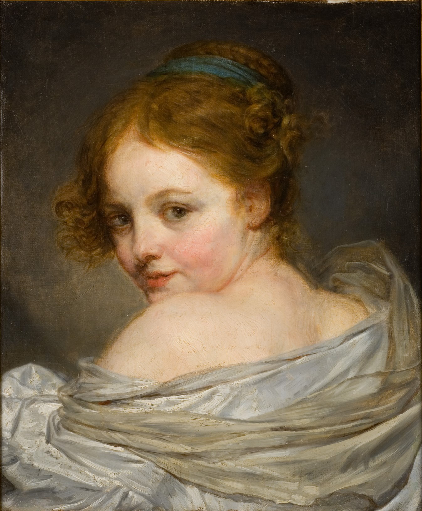 A portrait of a lightly skin toned girl with her head turned over her left shoulder. She has reddish hair with a light blue tie or ribbon running through it. Her face has rosy, pink cheeks and her lips are a light red color. Her shoulder the back of her neck and her left shoulder is uncovered revealing some skin. The rest of her upper back is covered by a very light brown and white clothing. The backdrop is various shades of gray.