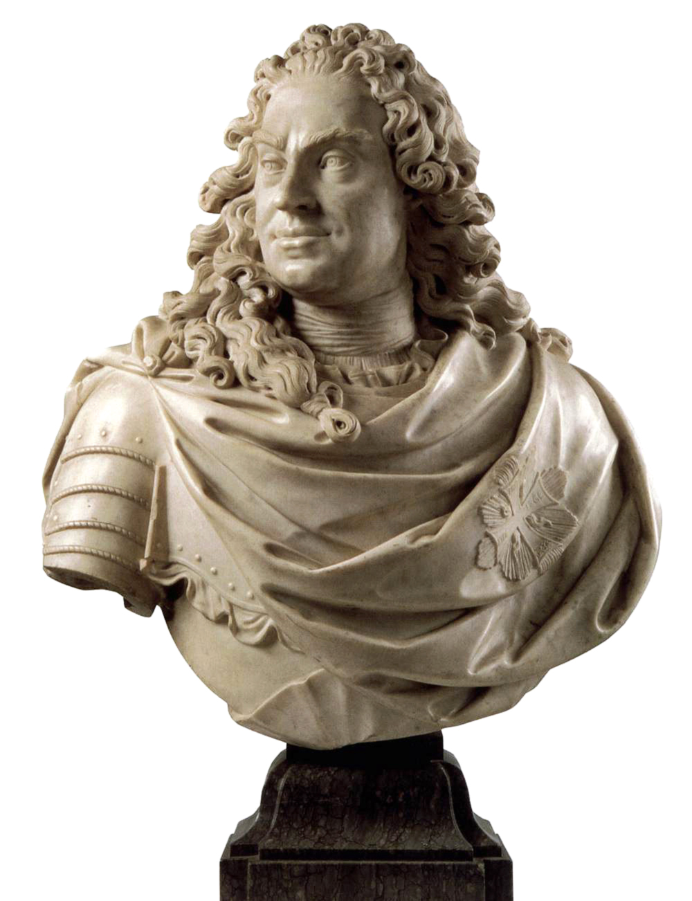 A photograph of a sculpture of the head and chest of a man. The man has long curly which reaches to his shoulders. He wears a robe that has a cross on the right, and under it is a metal breast and should plate.