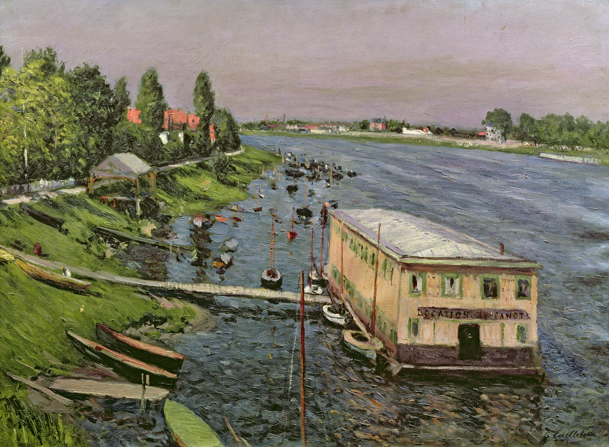A painting of a large yellow building with a white roof floating on a pontoon in a wide river. Dozens of empty boats are docked along it and the green bank or shoreline to the left. Above it, there is a white path wrapping around large green trees towards a set of buildings with red roofs. In the background across the river seems to be more buildings along with forests filled with green trees. This all lays under a gray and purple sky.