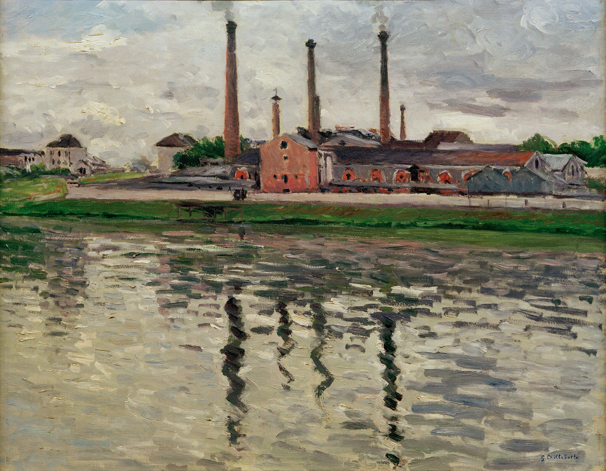 A painting showing a red and gray factory along a green shoreline. The factory has four brick chimneys around it. In the foreground, there is a river which it water is reflecting the factory behind it. The blue sky has been covered by gray clouds.