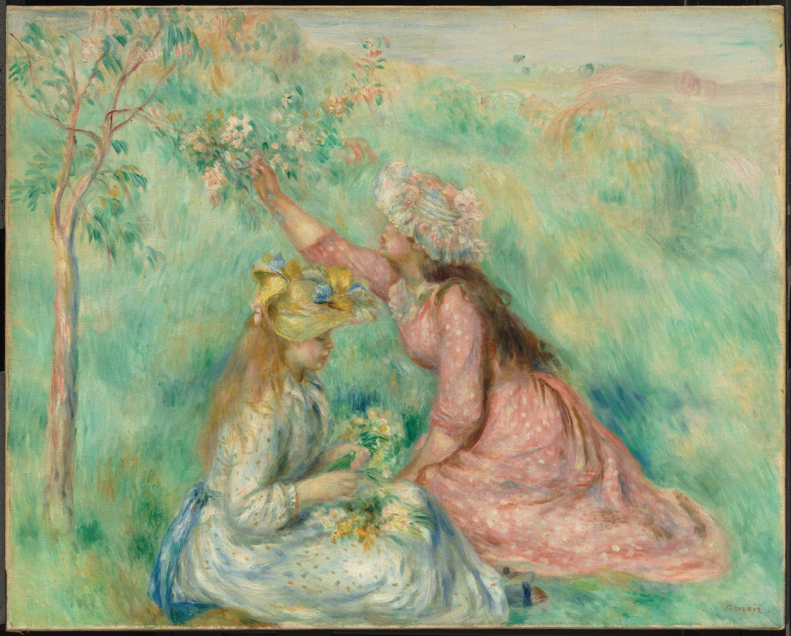 A painting depicting two young women in a grass meadow. One sits with a light a blue dress fiddling with a set of flowers. The other wears a pink dress and reaches out to pick flowers off a small tree. They both wear hats decorated with flowers.
