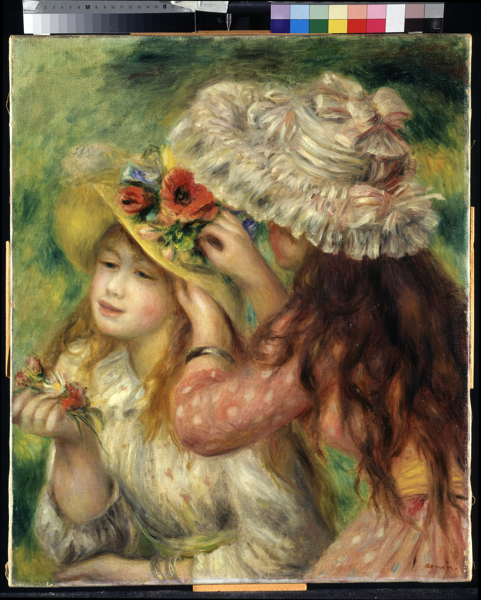 A painting of two girls decorating a hat. On the right is a brunette seen from behind, andon the left is a strawberry blonde girl. The sketch rests on a large brown paper. Above it is a grid of an assortment of colors.