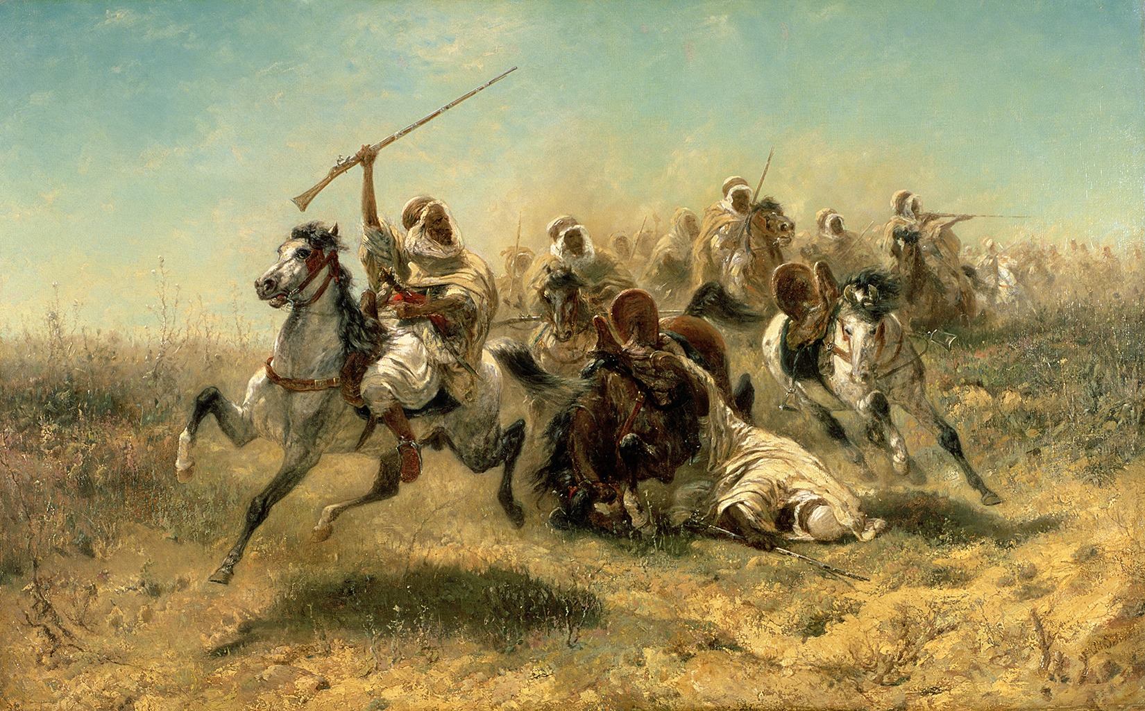 A painting of a large cavalry charge of horsemen over a dry and rocky grass field. The men are holding and firing rifles and wearing large white tunics and hoods. The leading horseman raises his rifle in the air with one hand. To his right, a fellow horseman lays on the ground presumably dead, with his horse crumpled over.
