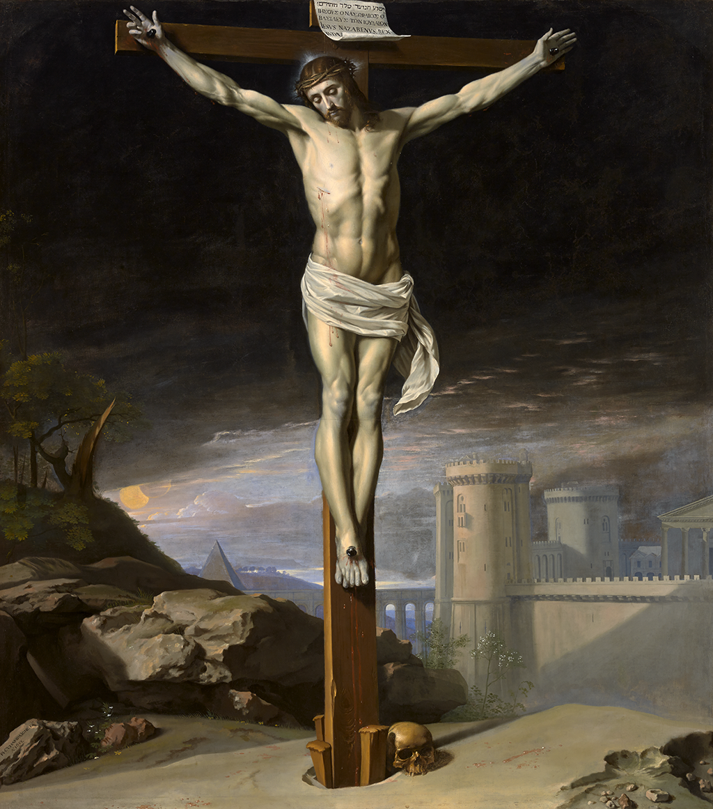 A painting depicting a man with his arms stretched out, and his hands and feet are nailed to a wooden cross. The man wears a white cloth around his waist and has a wound under his rib which leaks out blood. On his head is a crown made of thorns. At the top of the cross, there are pages nailed to it. At the bottom of the cross is a human skull.  In the background of the painting, there is a hill made up with rocks along with a large gray fort or castle under a dark and cloudy sky.  Further back, there is also a pyramid which stands near the Sun which is going down.